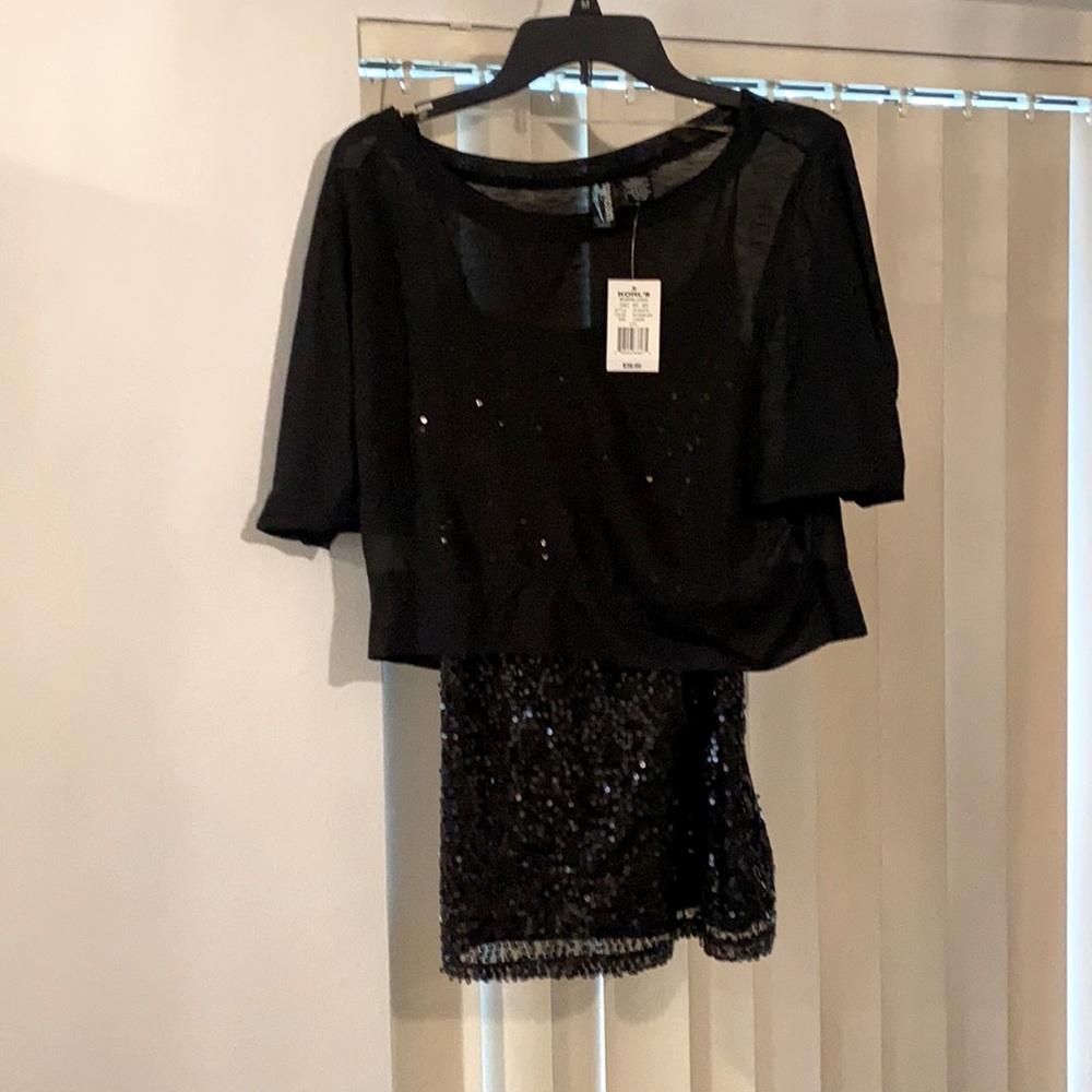 Sequins tank underneath with attached half top black slightly see through shirt